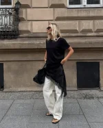 Váy lụa vạt xéo mặc cùng quần dài, xu hướng phá cách mùa thu