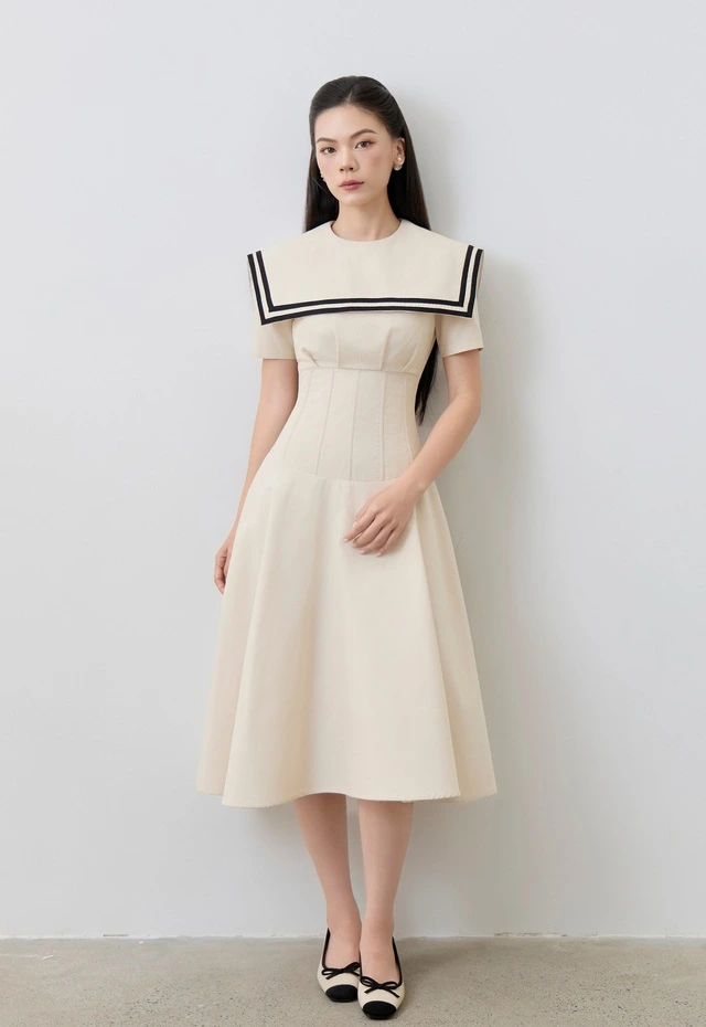 Giấu khuyết điểm tôn dáng chuẩn cùng váy chữ A-3.webp
