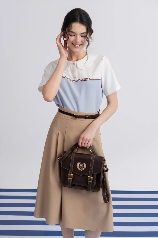 Mặc đẹp sang dễ dàng với cặp đôi áo và chân váy-4.webp