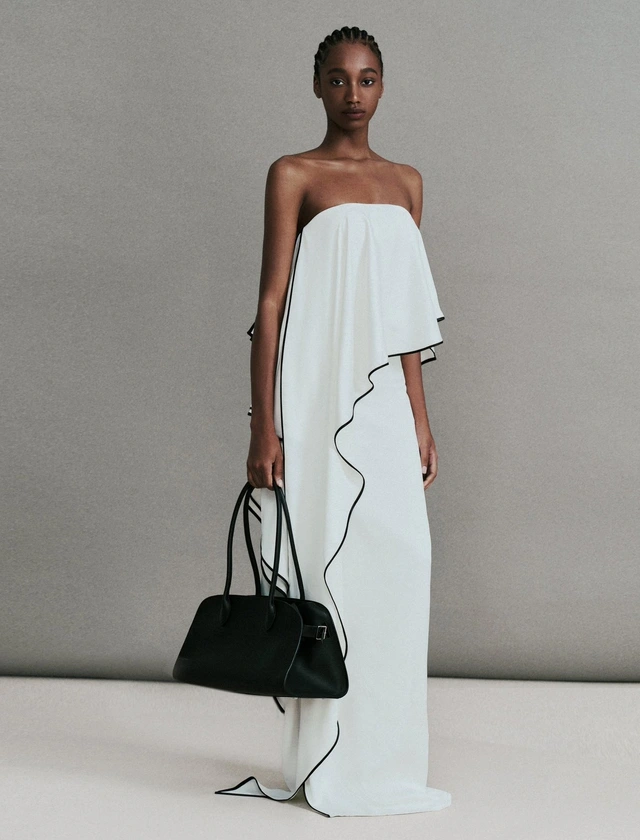 Phá vỡ giới hạn chinh phục mọi phong cách với đầm dự tiệc trắng đen-3.webp