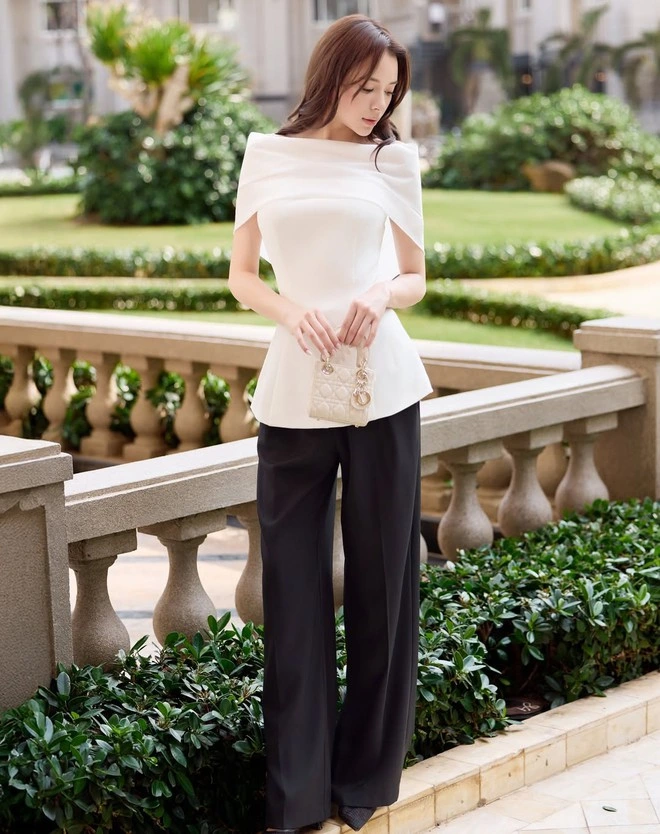 Tạo điểm nhấn cho eo thon với áo peplum trắng-6.webp